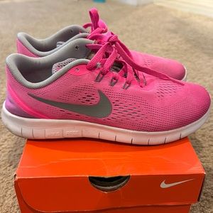 Pink kids Free Run Nikes